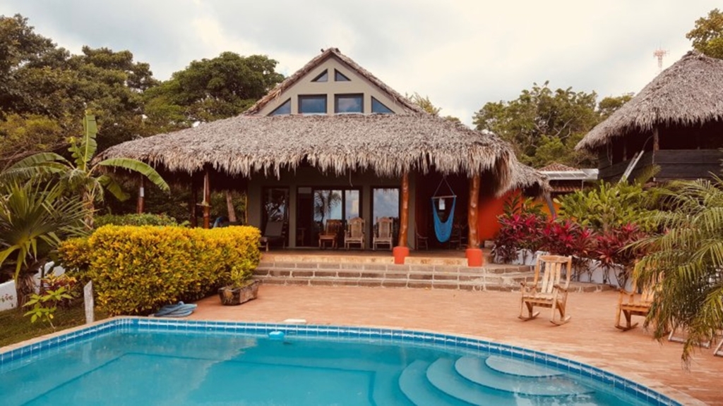 Tropical Red house 1 Tropical Red house 2