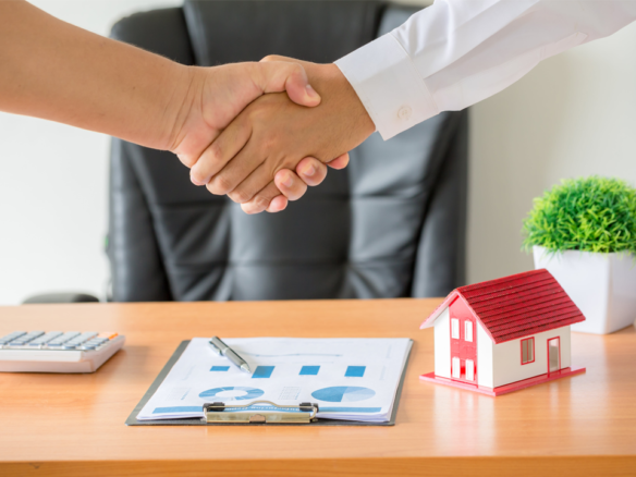 hands agent client shaking hands after signed contract buy new apartment