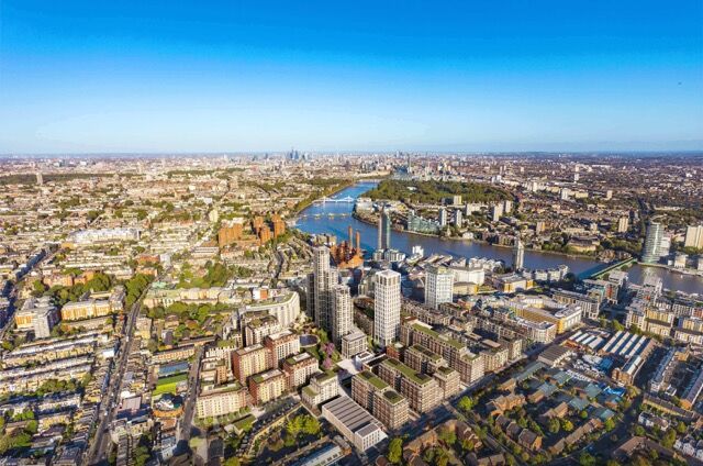 Aerial view of Fulham, London, showcasing the river and city skyline.