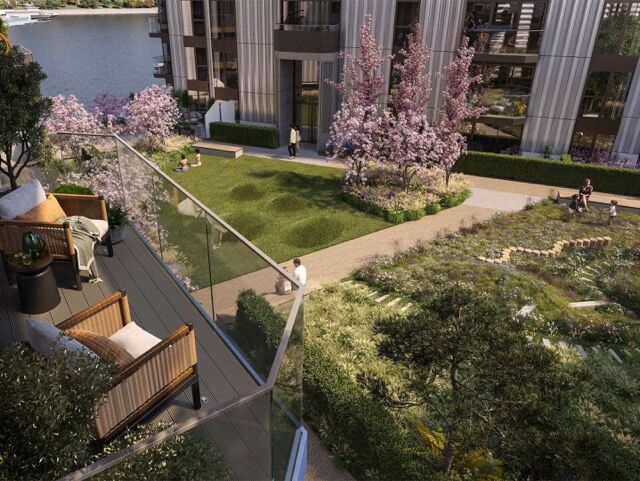 Modern apartment with balcony overlooking lush garden in Woolwich, London.