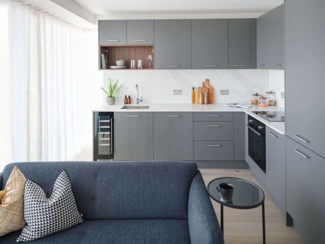Contemporary grey kitchen with minimalist design in Woolwich, London.