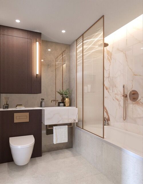 Bright bathroom with marble accents and modern fixtures.