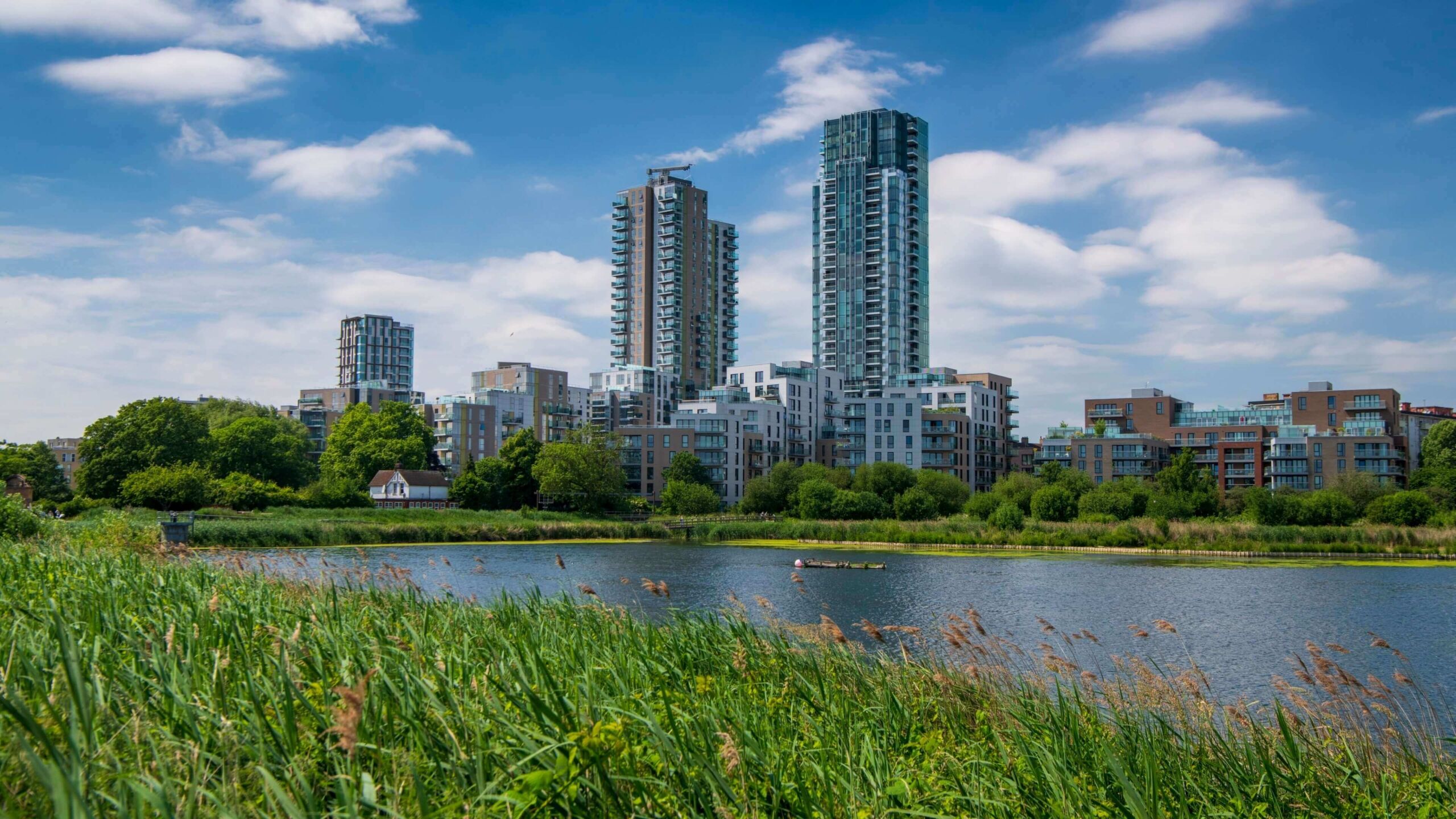 Modern high-rise buildings near green parks in Wandsworth, London.