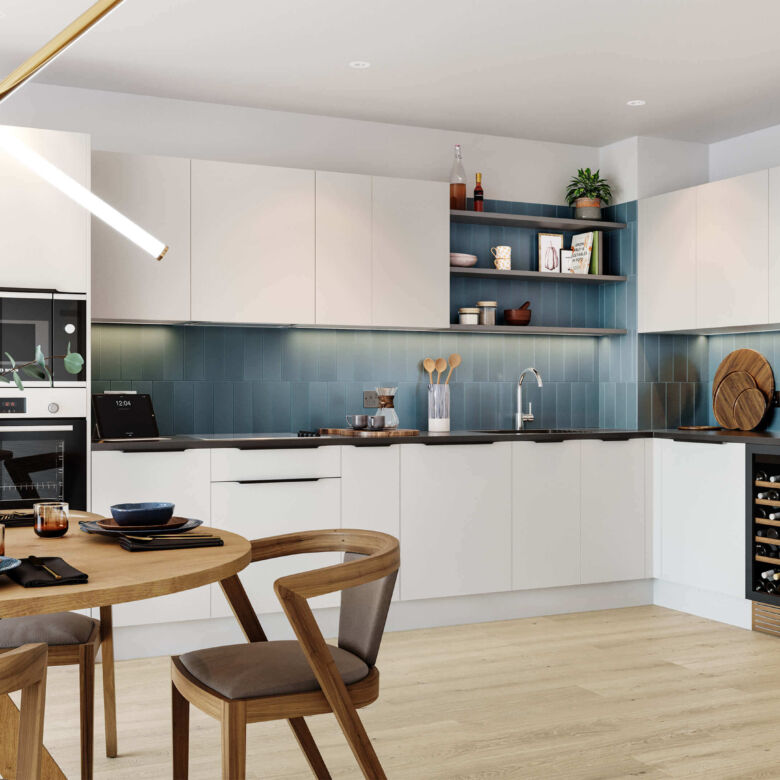 Contemporary white kitchen with blue accents in a luxury London apartment.