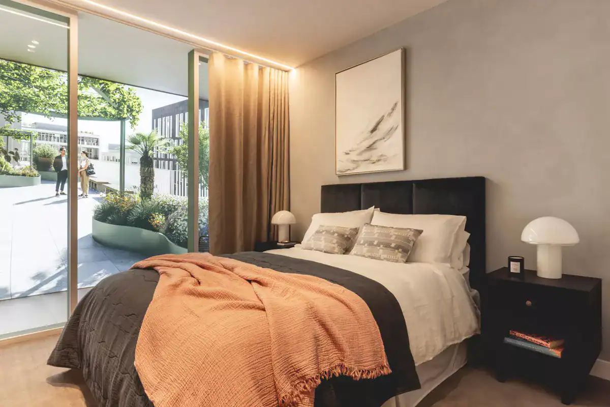 Luxury bedroom in Capella, King's Cross apartments with modern decor and natural light.
