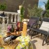 Outdoor terrace with seating and decorative elements.