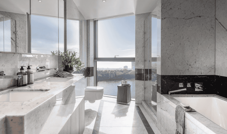Modern luxury bathroom with city views in Chelsea waterfront residences.