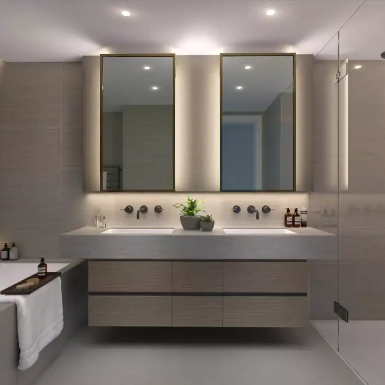 Modern bathroom featuring double mirrors, a sleek vanity, and a spacious bathtub for luxurious livin.