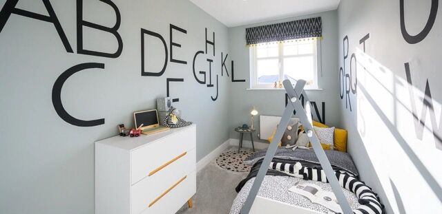Bright children's bedroom with alphabet wall decor in Wallingford.