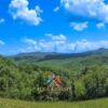 Beautiful Tuscan landscape with rolling hills and lush greenery close to the coast.