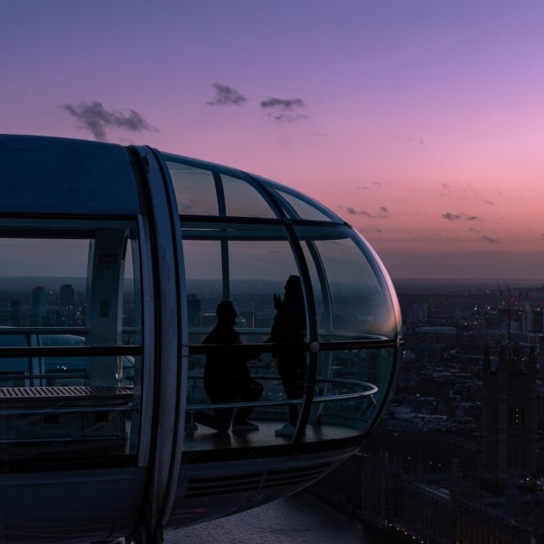 Modern glass capsule with city views in London skyline.
