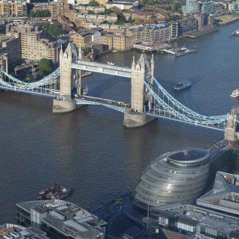 Aerial view of Tower Bridge and City Hall in London, UK.
