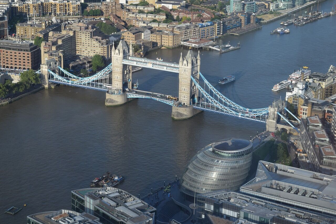 Aerial view of Tower Bridge and City Hall in London, UK.