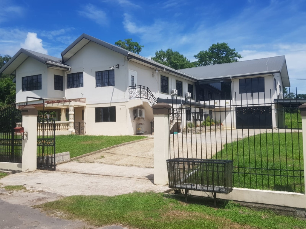 Building with 3 Apartments on 1 Acre of Land – for Sale in OTAHEITE Trinidad and 1 00 8 2