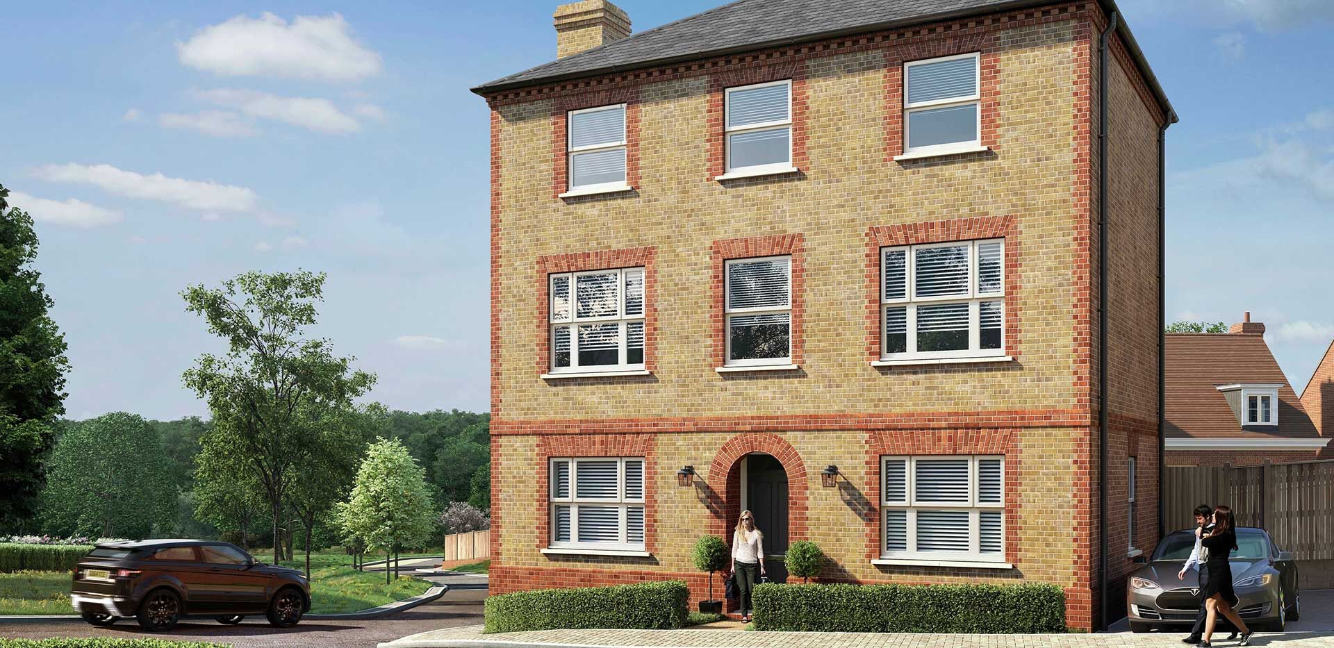 Modern brick house in Enfield with large windows and lush surroundings.
