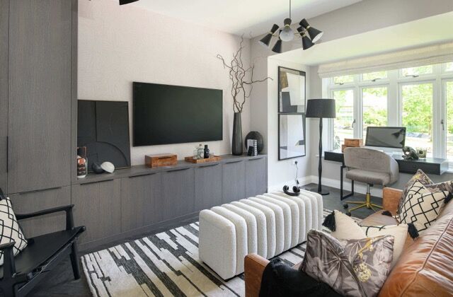 Bright living room with contemporary decor and large windows in Hildenborough, Kent.