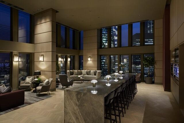 Elegant interior of a high-end living room overlooking London skyline at Pan Pacific London.
