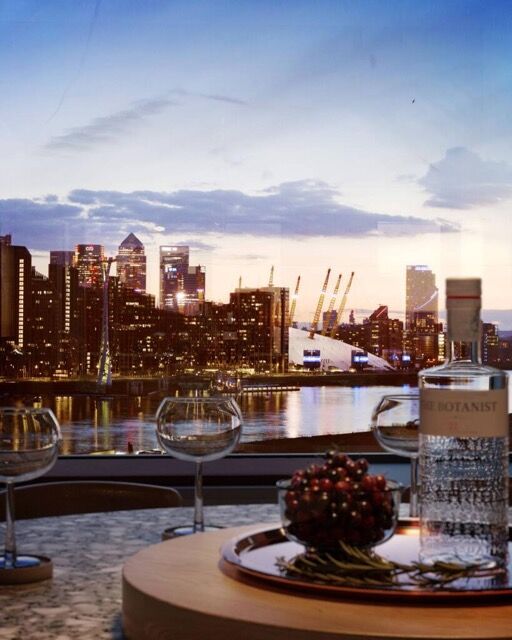 Stunning view of East London's skyline from a riverside dining area.