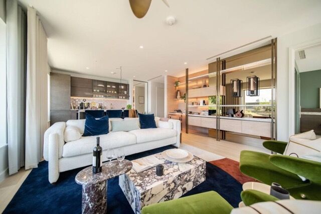 Elegant living room with river views and exclusive amenities in East London. Perfect for a luxurious.