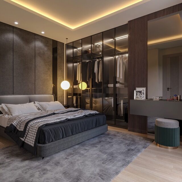Stylish bedroom with walk-in closet in Mersin Mezitli, featuring contemporary decor and lighting.