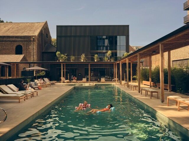 Luxurious pool at modern riverside residences in West London.