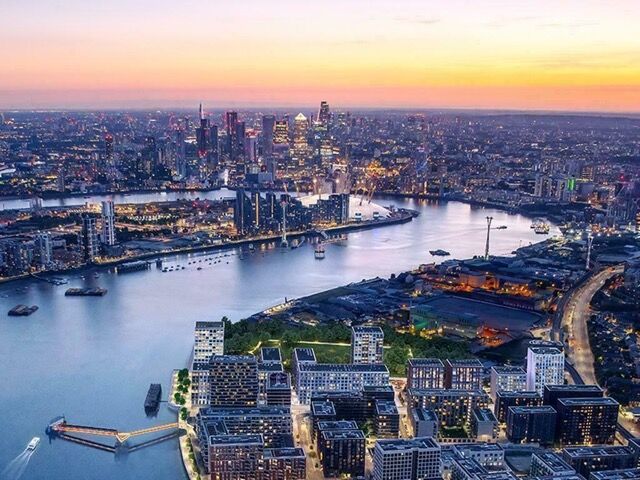 Modern riverside apartment with stunning city views in East London.