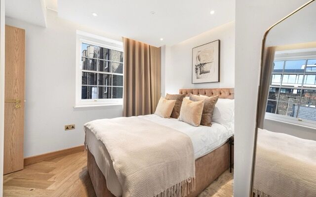 Elegant bedroom with contemporary furnishings in the heart of Marylebone, London.