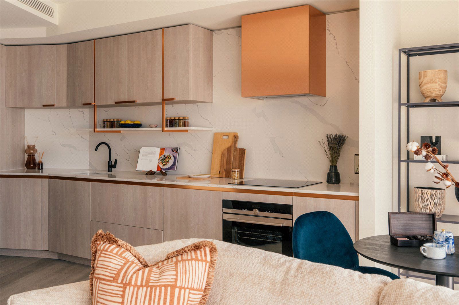 Modern kitchen in luxury Canary Wharf apartment with sleek cabinetry and contemporary design.
