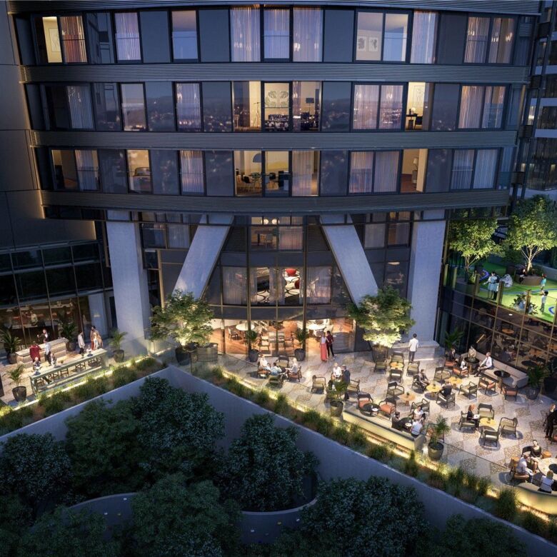 Luxury apartments with outdoor dining and green spaces in Canary Wharf.
