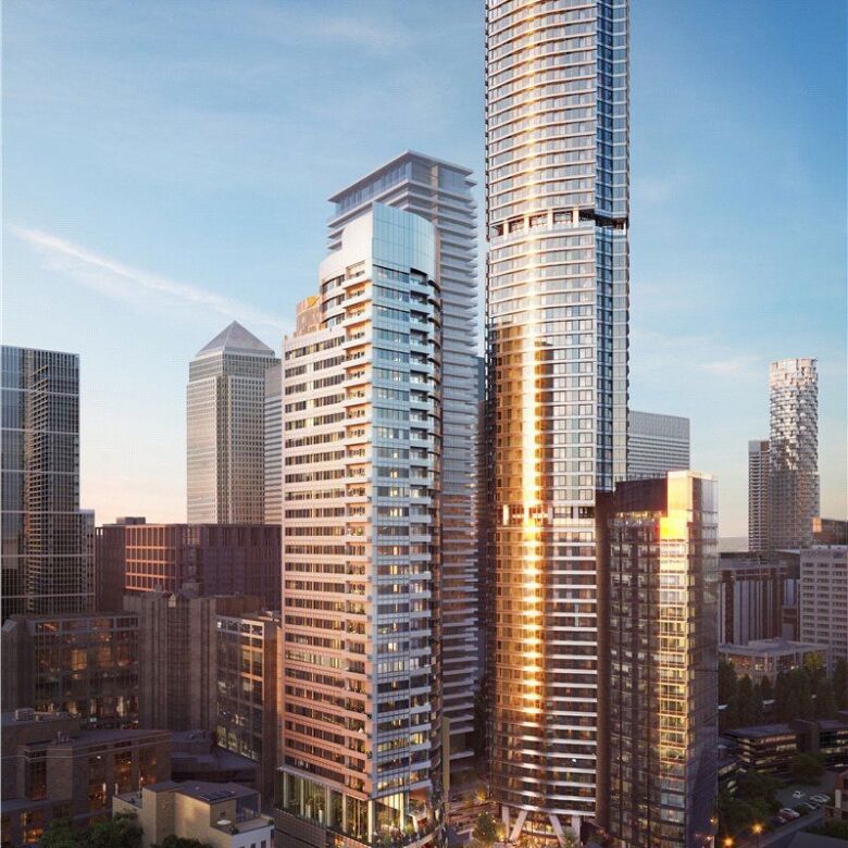 Modern skyscraper in Canary Wharf, London, with glass facade and stunning city views.