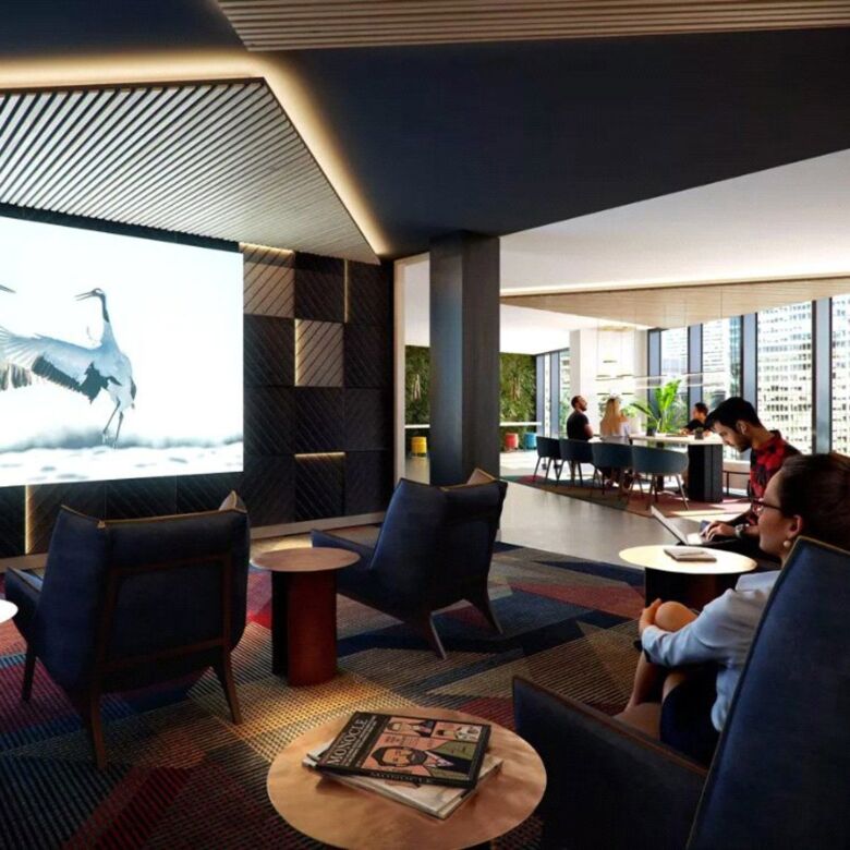 Luxury lounge with seating and large screen in Canary Wharf.