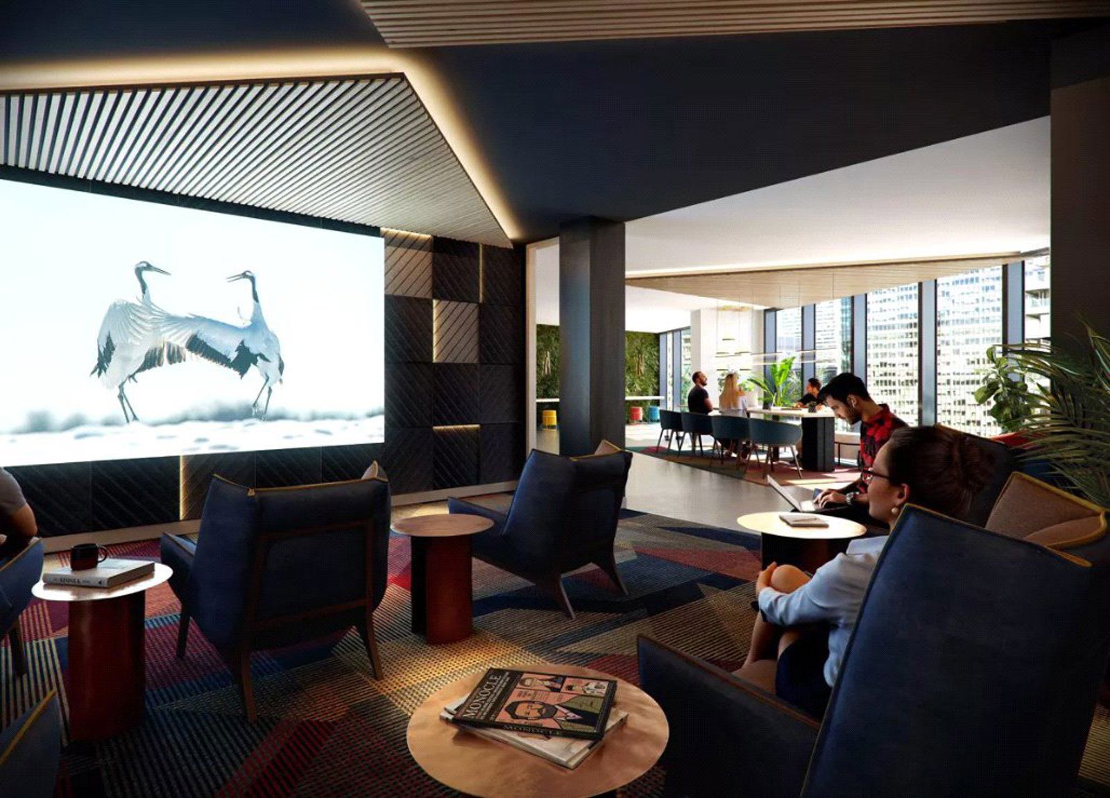 Elegant interior with comfortable chairs and large screen display.