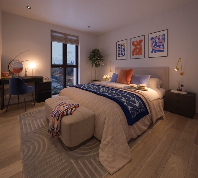 Spacious bedroom featuring contemporary decor, large window with panoramic cityscape, and stylish fu.