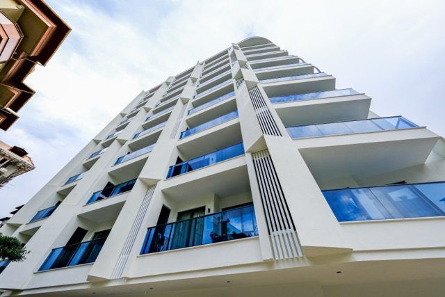 Bright 1+1 apartment with sea views in Guller Pınarı, Alanya, close to the beach and amenities.