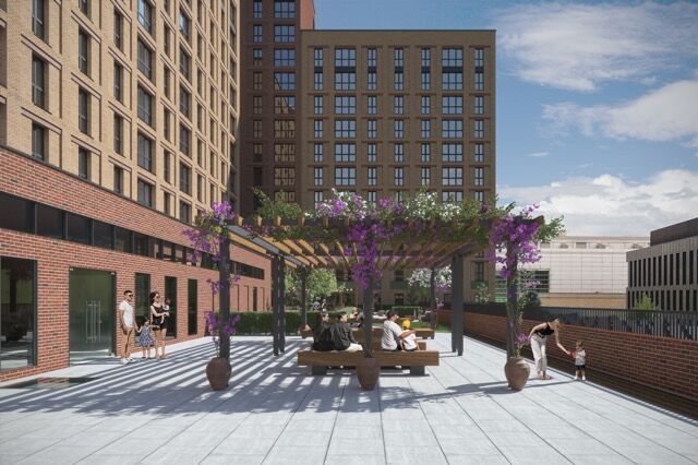 Panoramic northeast city views from the 16th-floor terrace in Manchester. Modern outdoor space with.
