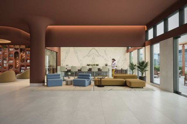 Luxurious hotel lobby with contemporary furniture and natural light in Manchester.