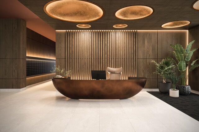 Stylish 9th floor apartment reception with city views in Manchester.