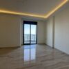 Modern interior with sea views from the spacious penthouse balcony.