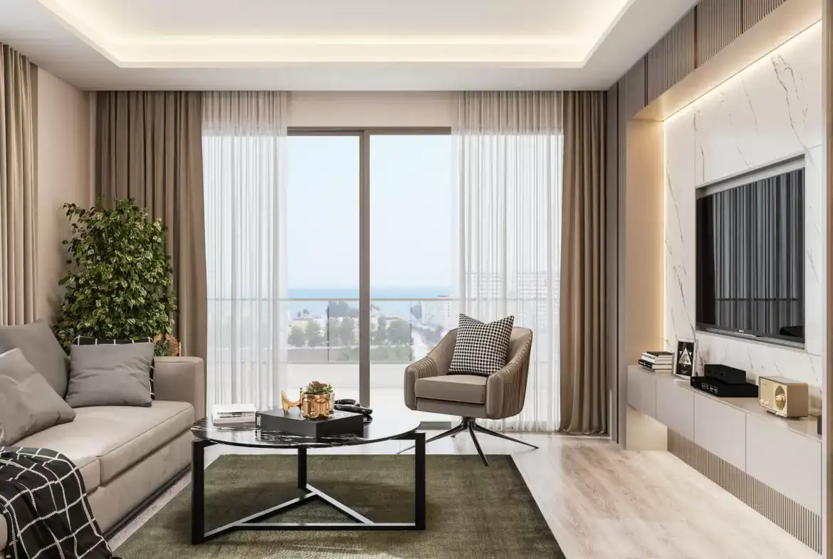 Sea and city view living room with large windows in Erdemli Mersin apartment.