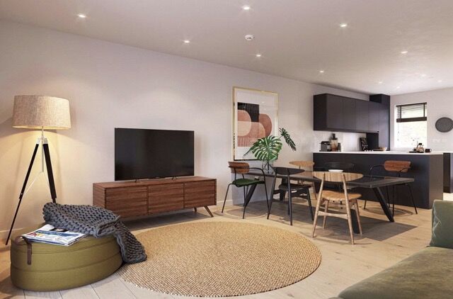 Modern interior of riverside townhouses in Salford, Manchester, featuring stylish living space and o.