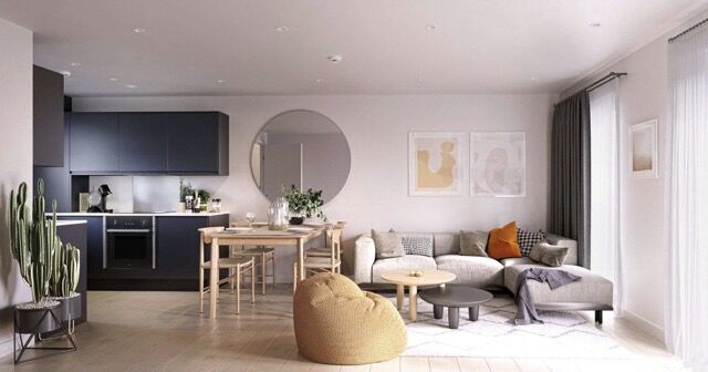 Modern interior of a riverside townhouse in Salford, Manchester, featuring a stylish open-plan livin.