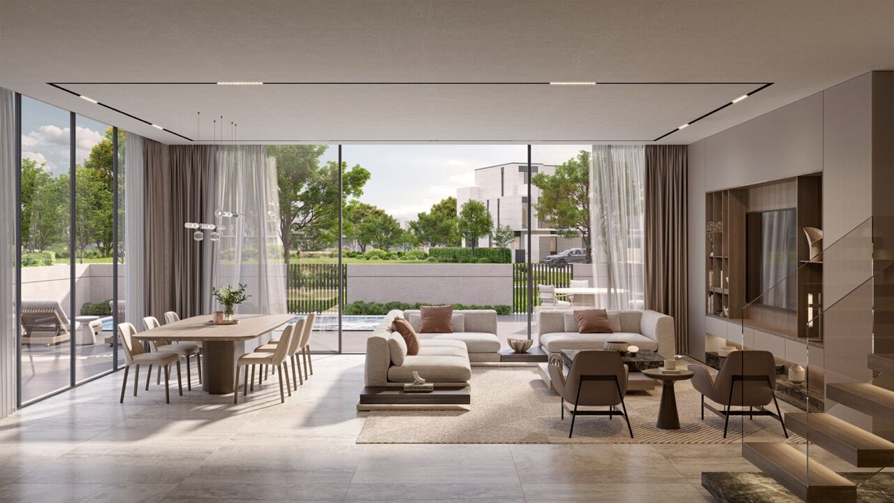 Luxury Golf Villas Dubai Elegant living room with modern furniture and large windows overlooking lush greenery.