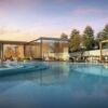 Luxury golf villas with pool and outdoor lounge in Jumeirah Golf Estates, Dubai.