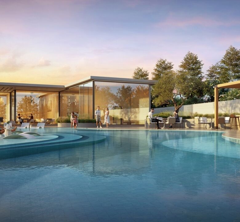Elegant pool area at luxury golf villas in Jumeirah Golf Estates, Dubai.
