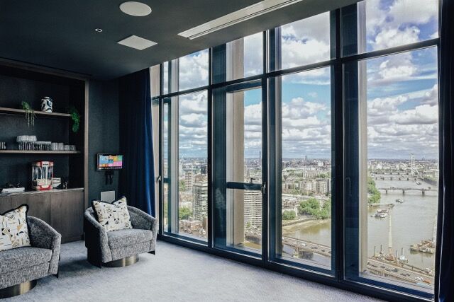 Stunning interior with panoramic river views from a high-rise apartment in One Nine Elms, London.