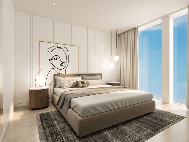 Elegant seaside apartment with modern decor and stunning ocean views.