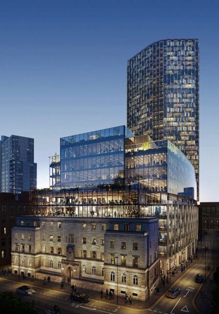 Luxury Manchester residences with modern glass architecture and city views.