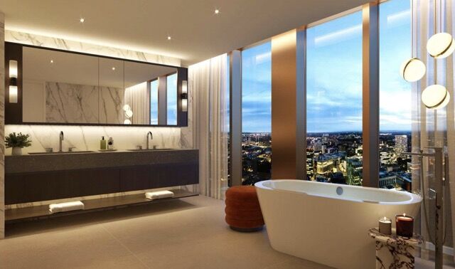 Elegant bathroom with city views in Manchester luxury residences.
