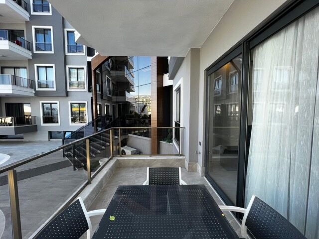 Balcony view of modern 1-bedroom apartment with full amenities in Kargıcak, Alanya. Perfect for comf.