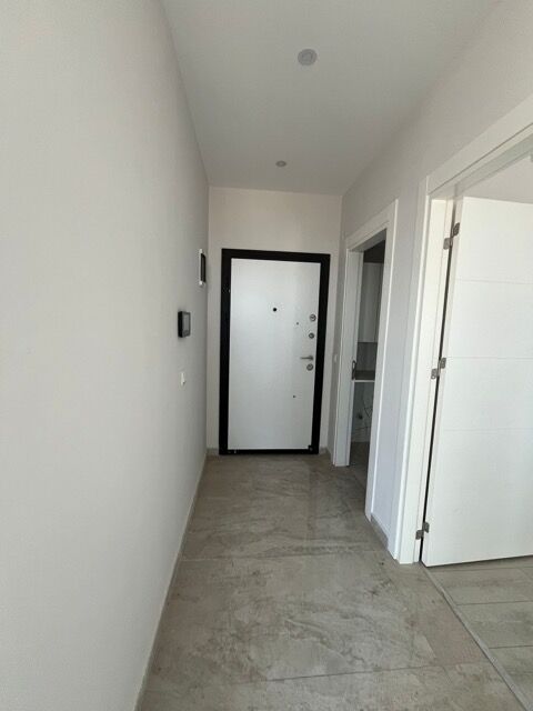 Entrance hallway of a modern 1-bedroom apartment in Alanya with full amenities.